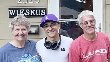 Aubin Licht with host parents Lisa and Marty Wieskus. This is the third exchange student that Lisa and Marty have hosted.