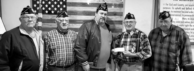 Slayton American Legion Post 64 Commander Brad Pagel accepting $2000 donation from DAV SW MN Chapter 33 towards the Vietnam Wall and Cost of Freedom displays coming to Slayton during the Murray County Fair Aug 15-20 2023.