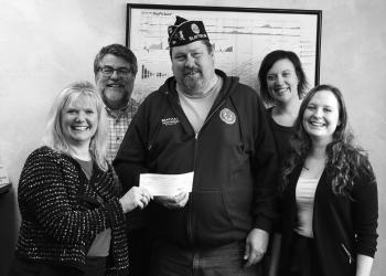 Pictured Left: Slayton American Legion Post 64 Commander Brad Pagel accepting $500 donation from Investors Choice Financial Services towards the Vietnam Wall and Cost of Freedom displays coming to Slayton during the Murray County Fair Aug 15-20 2023.