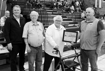 Representing Woodstock Communications are Nathan Knuth and Ken &amp; Marlys Knuth. With them is MCC School Board Member Tony Clarke.