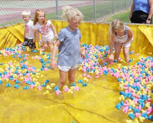 The river was deemed too deep this year, so the Currie Duck Races were held in a Fireman’s tank. These children had a great time mixing the ducks. The winners chosen were: $750 - Bev Schreier, $500 - Pat Sweetman, $250 - Theona Weber, $100 each - Cora Espeset, Anita Peschges, Mike Galvin, Tom Bailey Sr., Dave LeClaire.