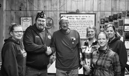 Slayton American Legion Post 64 Commander Brad Pagel accepting $2000 donation from Currie Town and Country towards the Vietnam Wall and Cost of Freedom displays coming to Slayton during the Murray County Fair Aug 15-20 2023.
