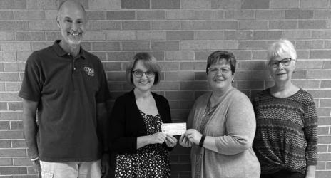 They next made a donation to Hearts and Hands, MCC Fund and Backpack Lunch Program. Pictured are Marv Nysetvold, Nikki Cheskie, Jen Nelson and Ruth Hoyme (below).