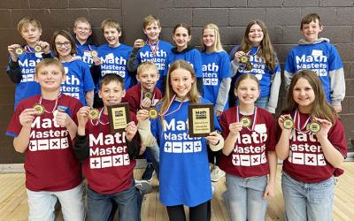 Mathmasters Students: (5th Grade Blue): Brenner Schryvers, Christian Hansen, Gavin Wynia, Cassie Scandrett, and Caroline Stoel. (6th Grade Red): Hadley Harms (front), Carter Larson, Addison Winters, Wes Biegler, Garret Joens, Zach Haken, Isabela Schreier, Kyra Baumgartner, Paige Schuur, and BR Heronimus.
