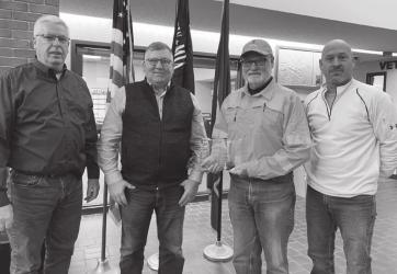 Pictured here are Randy Groves, Dennis Welgraven, Paul Kirchner and Lonn Jackels. Paul was presented a plaque for this retirement from the County.