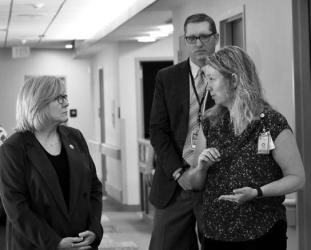 Top Photo: Congresswomen Michelle Fischbach visited MCMC this past week. Pictured here are MCMC CEO Luke Schryvers, Fischbach and Becky Wifstrand, who serves as Director of Federal Policy and Regulatory Affairs for the Minnesota Hospital Association. Bottom Photo: Fischbach speaking with CNO Monica VanOtterloo.