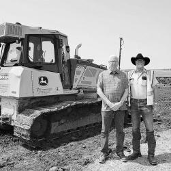 Murray County Engineer Randy Groves meets with Contegrity Group Job Supervisor Jim Theurer.
