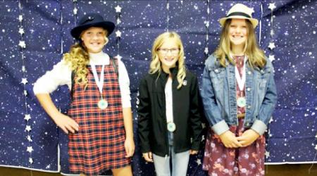3rd to 5th Grade Court of Honor Joelle Hellewell, Madilyn Kramer, and Annika Kopperud.