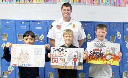 Slayton Fire Chief, Chris LeTendre, recognized these 5th grade students for their creative design talents on creating a poster to honor Fire Prevention Week. The Winners are L to R: 1st Gael Ortega, 2nd Casper Harms and 3rd George Haugen. Thank You to the Slayton Fire Department for taking the time to educate our youth on fire prevention.