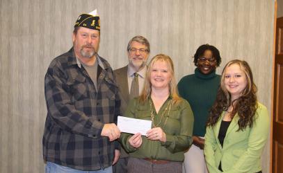 Investors Choice recently donated funds to the Slayton American Legion for the Remember the Fallen Campaign. Pictured with Slayton Legion Commander Brad Pagel are Jim and Carla Goedke, Alice Gomez and Zoey Brown.